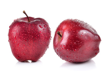 red apple with water drops on white background