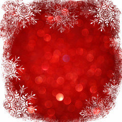 Defocused abstract red lights background with snowflakes overlay