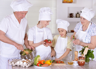 Happy family cooking together