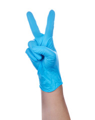 Hand of a medic wearing a blue latex gloves