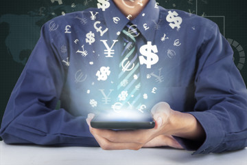 Person holds mobile phone with currency sign