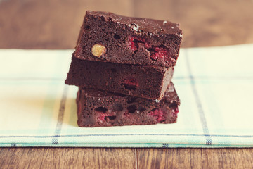 Chocolate brownies with raspberries