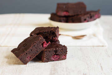 Chocolate brownies with raspberries