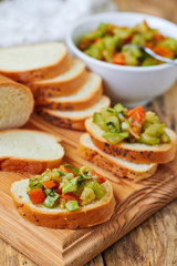 Vegetable caviar on a slice of baguette