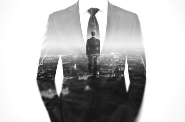 Double exposure concept with business man in modern suit - obrazy, fototapety, plakaty