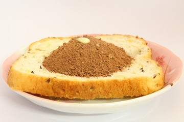 Powdered chocolate bread on a plate