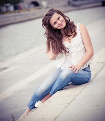 Portrait of a beautiful european woman smiling outdoors