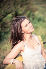 Fototapeta premium beautiful woman relax on the bench in park