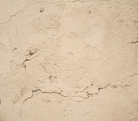 Texture of old wall covered with gray stucco