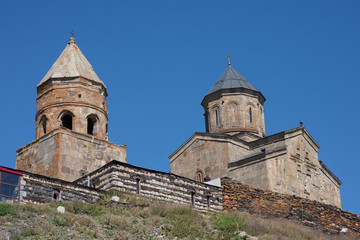 Fototapeta na wymiar Kazbegi (Stepantsminda), Georgia - The trinity church