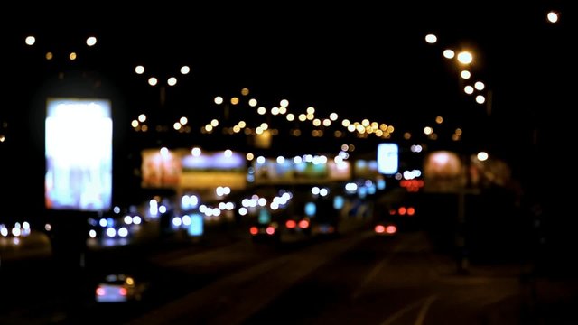 Blurred night traffic lights in city