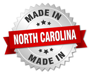 Obraz premium made in North Carolina silver badge with red ribbon