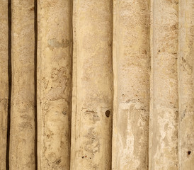 Texture of old wall covered with yellow stucco