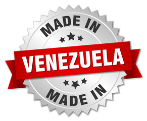 made in Venezuela silver badge with red ribbon