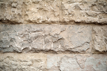 Wall texture of gray and yellow stone
