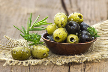 black and green olives marinated with garlic and fresh mediterra - Powered by Adobe