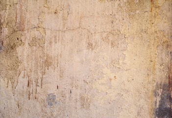 Texture of old wall covered with brown stucco