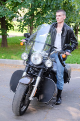 Fototapeta na wymiar Portrait of a nonconformist motorcyclist