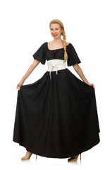 Fototapeta premium Tall woman in long black dress isolated on white
