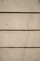 Texture of old wall covered with gray stucco