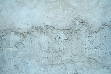 Texture of old wall covered with gray stucco