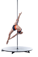 Female dancer performs difficult trick on pylon