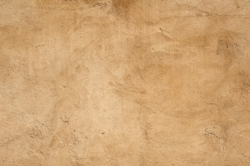 Texture of old wall covered with gray stucco