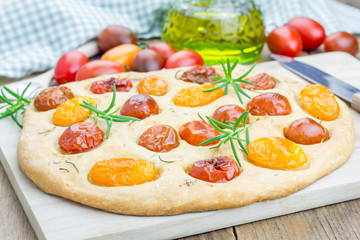 Focaccia with cherry tomatoes and rosemary