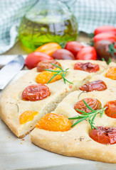 Focaccia with cherry tomatoes and rosemary