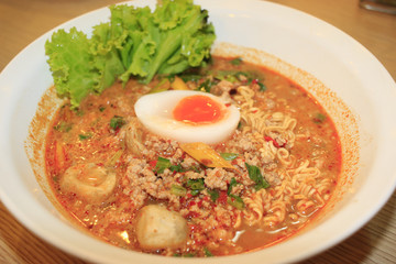 noodles with hot sour soup and minced pork with egg, thai style