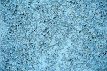 Texture of old wall covered with blue stucco