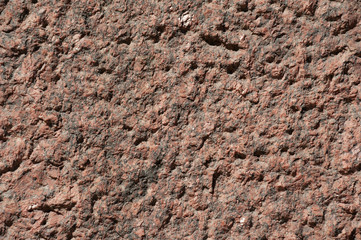 Texture of wall of polished pink granite