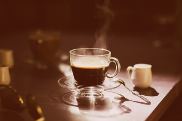 cup of hot coffee on the table