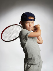 Little Boy Playing Tennis. Sport kids.Child with Tennis Racket © eugenepartyzan