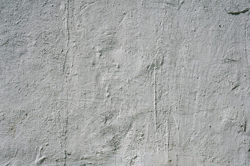 Texture of old wall covered with gray stucco