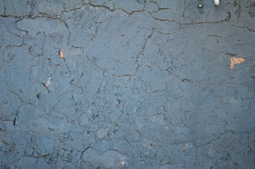 Texture of old wall covered with blue stucco