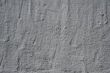 Texture of old wall covered with gray stucco