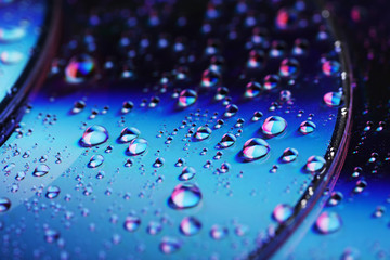 Water drops on cd, close up