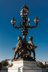 the bronze  statue of bridge Alexandre III, Paris, France.