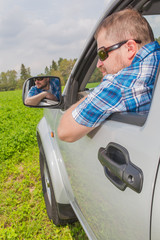 Man sitting in a car