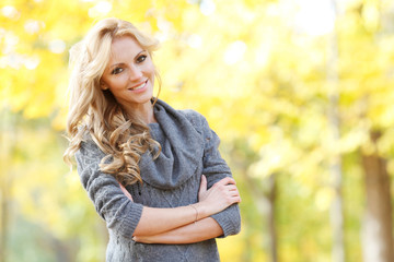 Woman in autumn forest