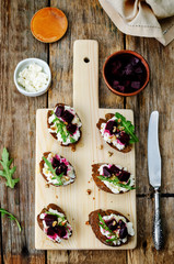 beet goat cheese arugula walnut honey crostini
