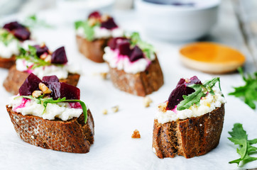 beet goat cheese arugula walnut honey crostini