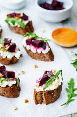 beet goat cheese arugula walnut honey crostini