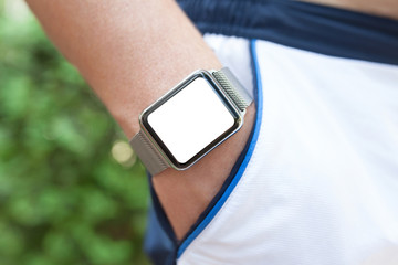 man hand and Watch with isolated screen in pocket shorts