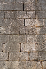 Natural old stone wall texture ancient ruin wall masonry
