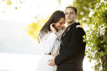 Young couple in the autumn park