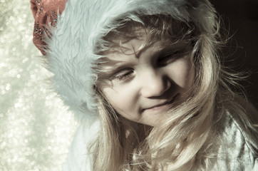 girl with santa claus cap