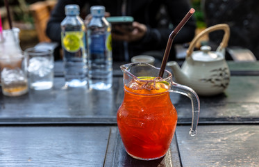 Refreshing Iced Tea with Lemon against a background
