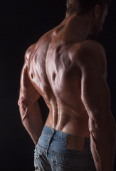 Fototapeta na wymiar Back of bodybuilder man